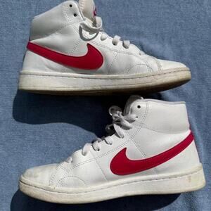 Nike white high top sneakers with bright pink/red Swoosh
